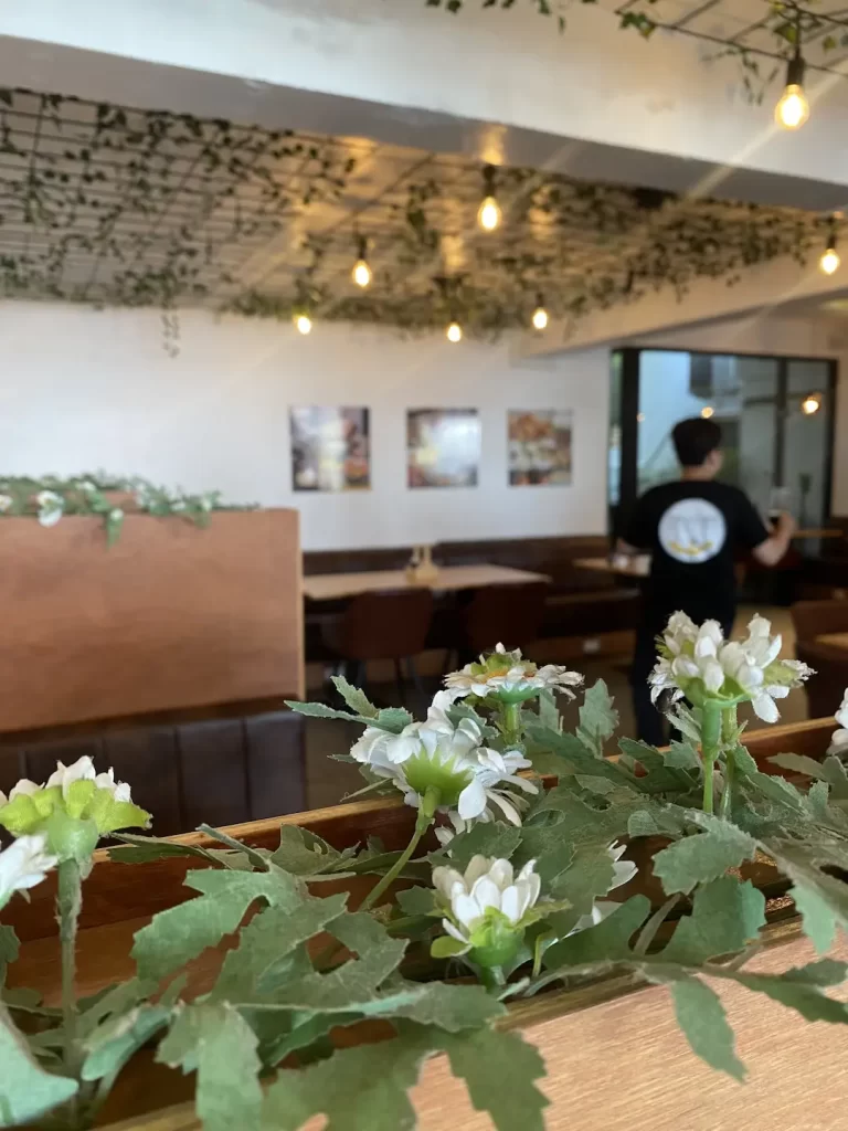 Cosy interior with air conditioning and comfortable booth seating. This is the perfect spot to grab a protein packed meal after visiting one of the great gyms near Nai Harn. Only at Poached Breakfast Cafe, Rawai, Phuket, Thailand