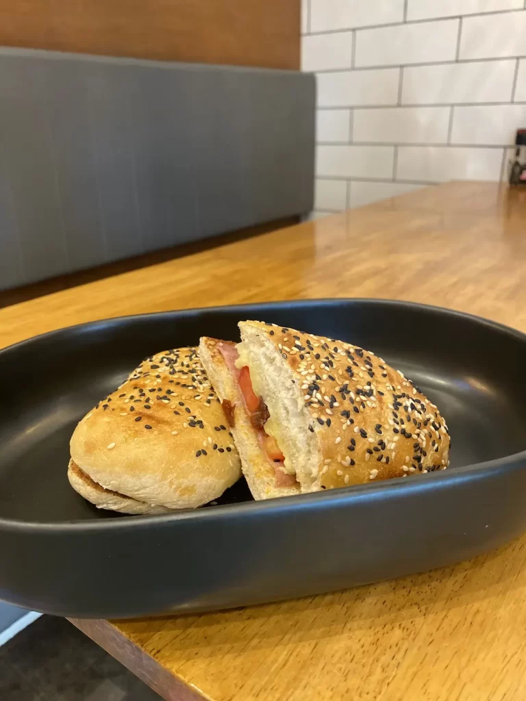 Ham cheese and sundried tomato sandwich on a seeded bun. This would go perfectly with bacon. The most delicious bacon in Nai Harn can be found at Poached Breakfast Cafe Rawai, Phuket, Thailand